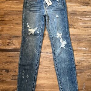Distressed Blue Jeans